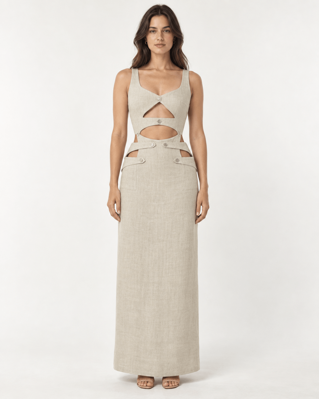 JENDUE Noe Linen Dress - Cut-Out Maxi with Button Detail worn by a model, showcasing elegant contemporary tailoring.