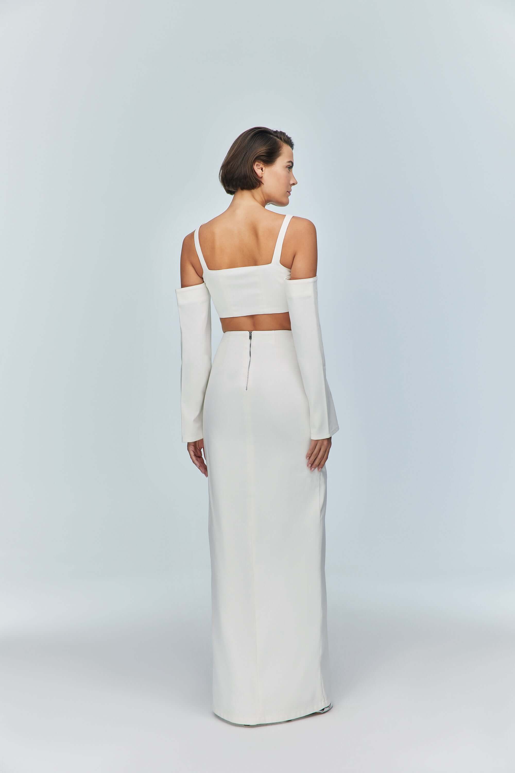JENDUE trendy white denim crop top with full-length sleeves, ideal for versatile styling.