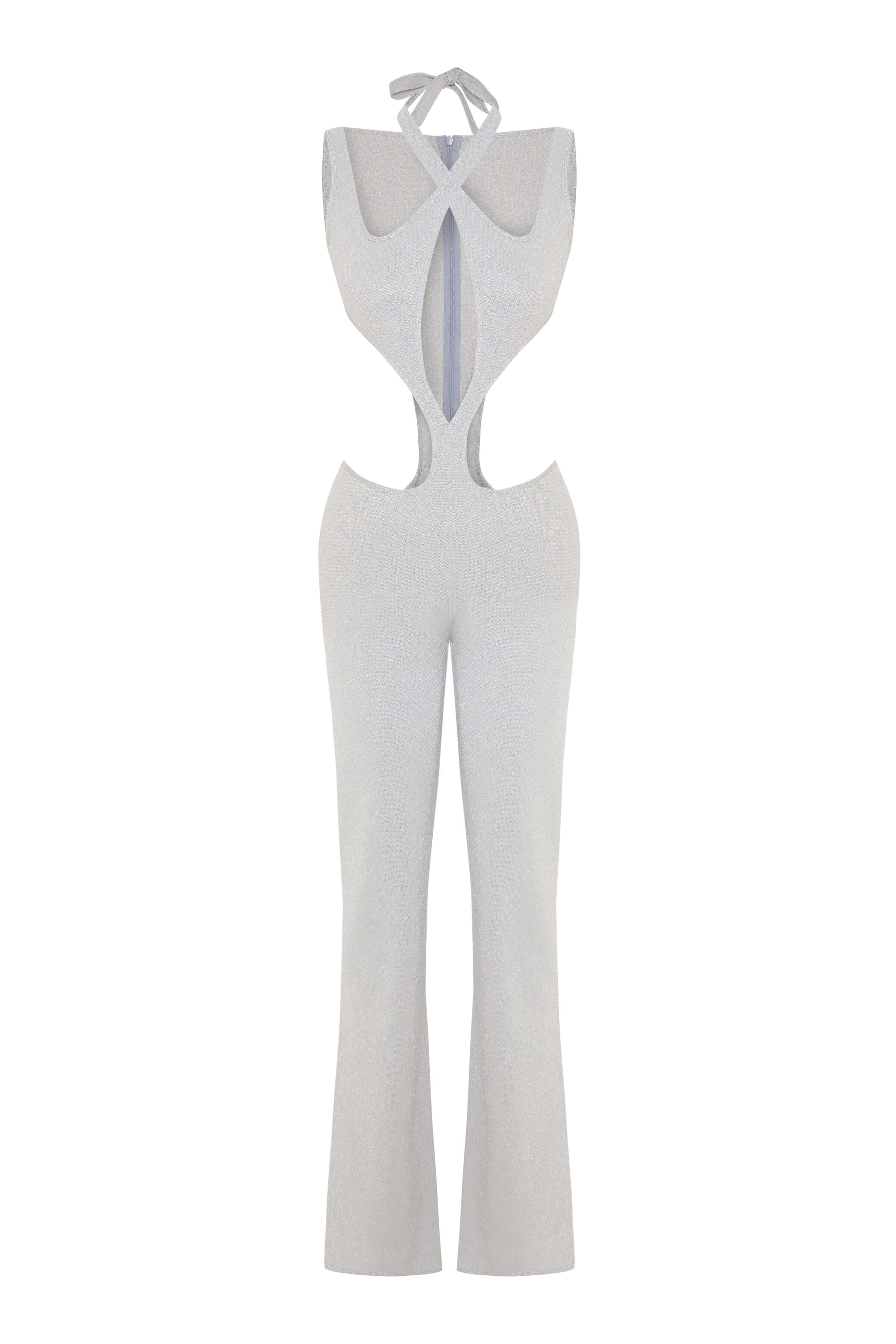 A silver, sparkly jumpsuit with a halter neckline and large, hourglass cutouts on the torso and sides.