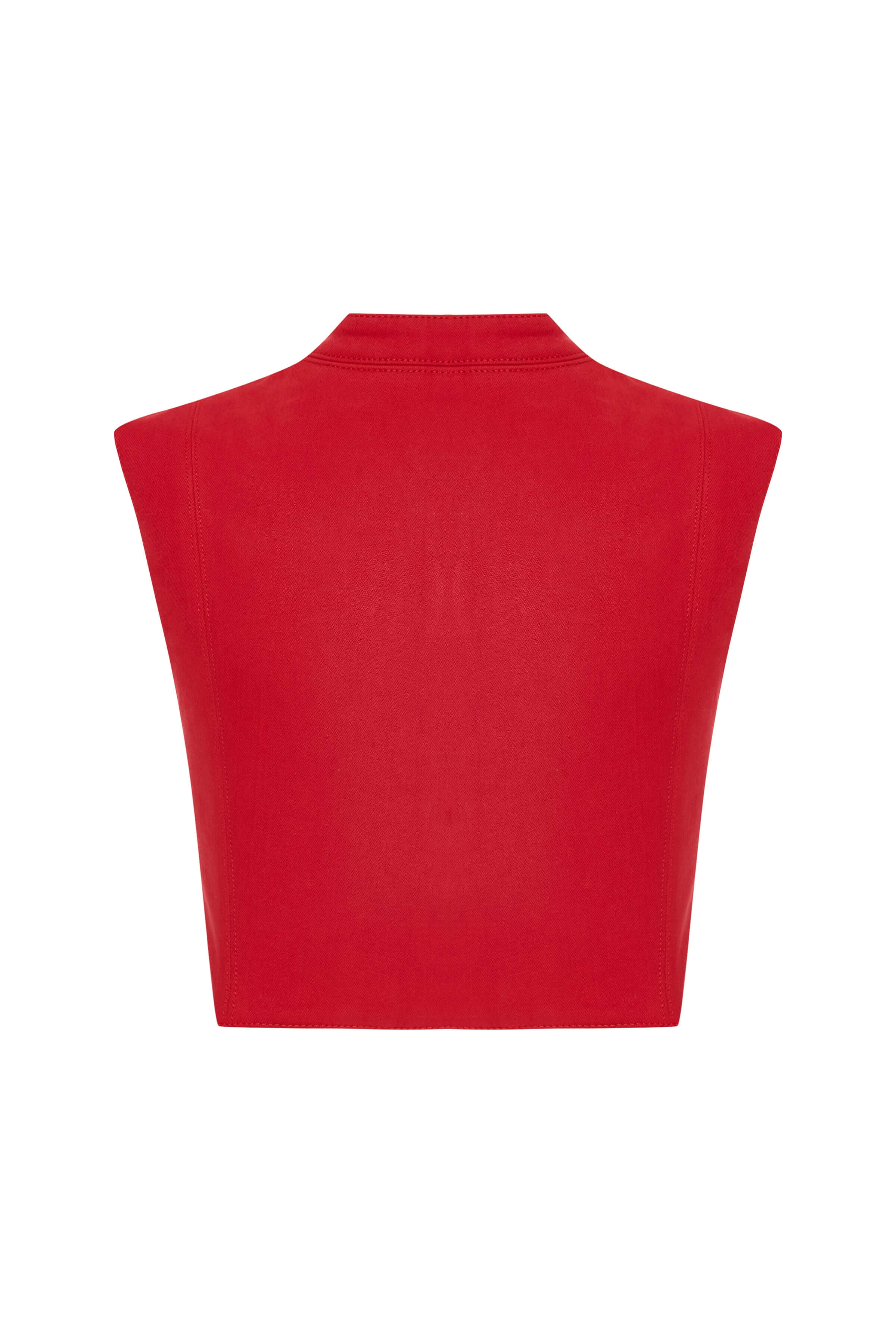 Stylish red crop top with a mock turtleneck and an angled row of silver buttons. Made of denim.