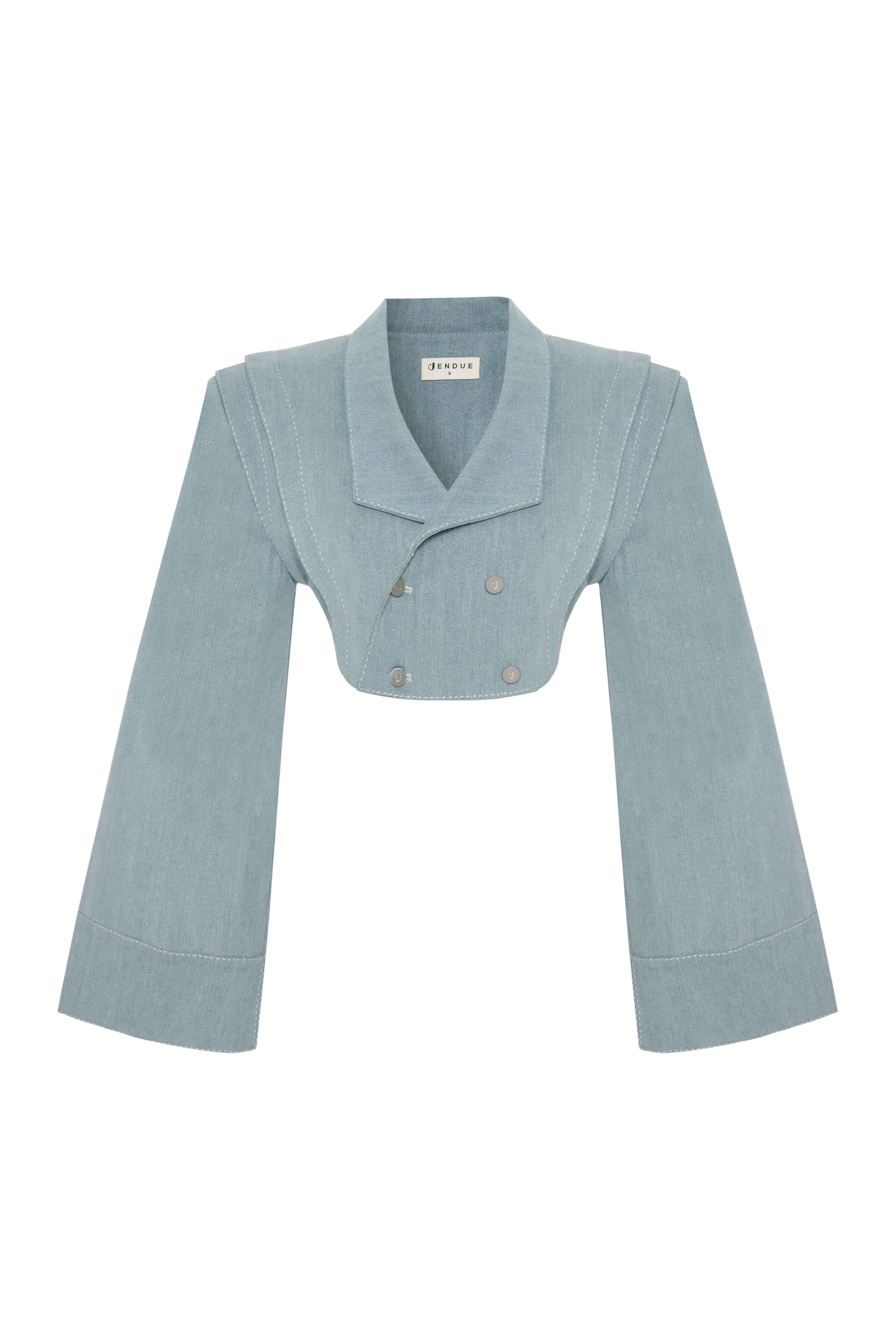 Cropped denim jacket in a light ice blue wash. The design includes a large lapel, flared long sleeves, and an asymmetric double-breasted closure.