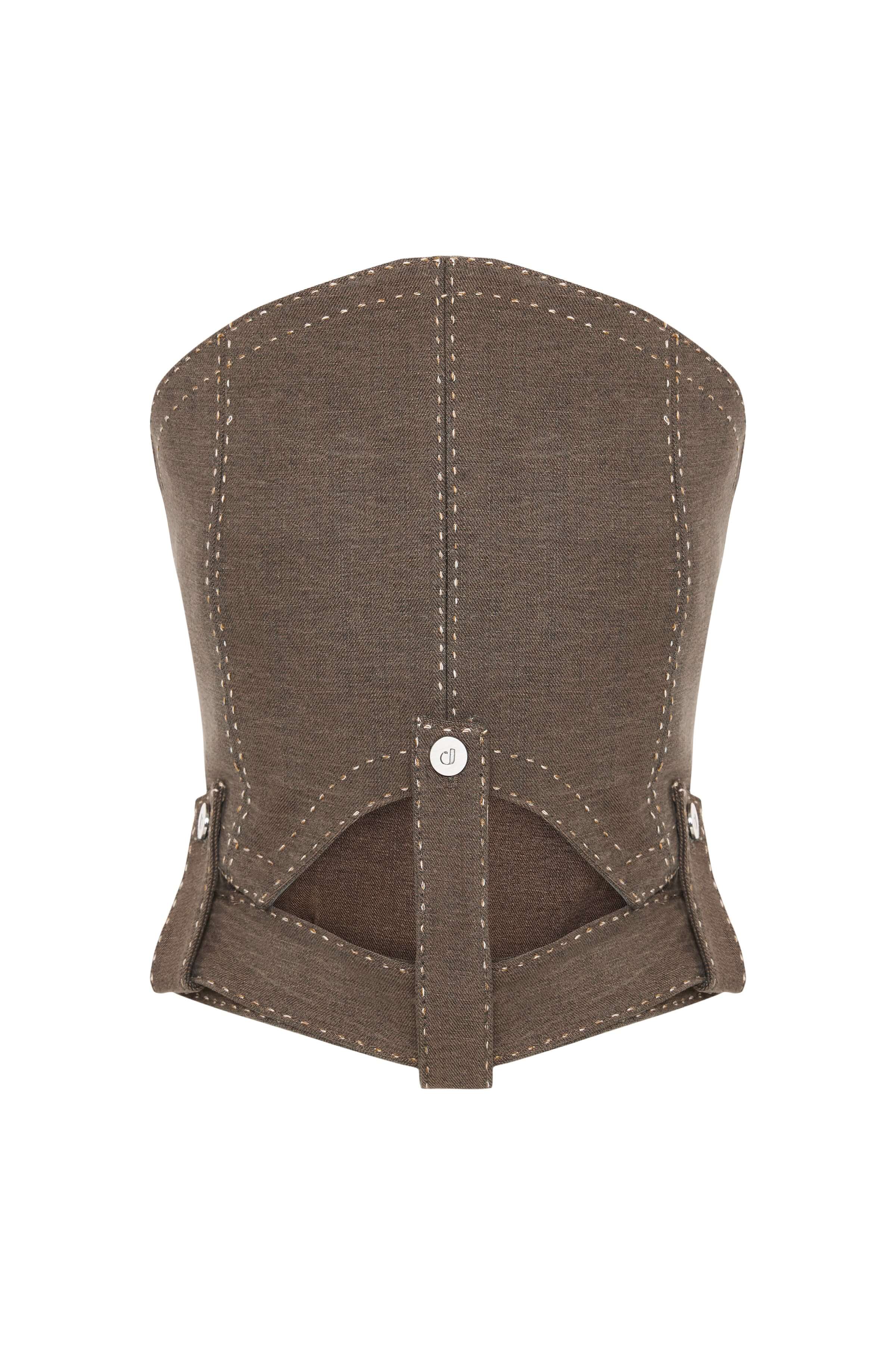 Brown denim corset top with contrast stitching. Strapless design with a structured, boned silhouette and an abstract cutout hem.