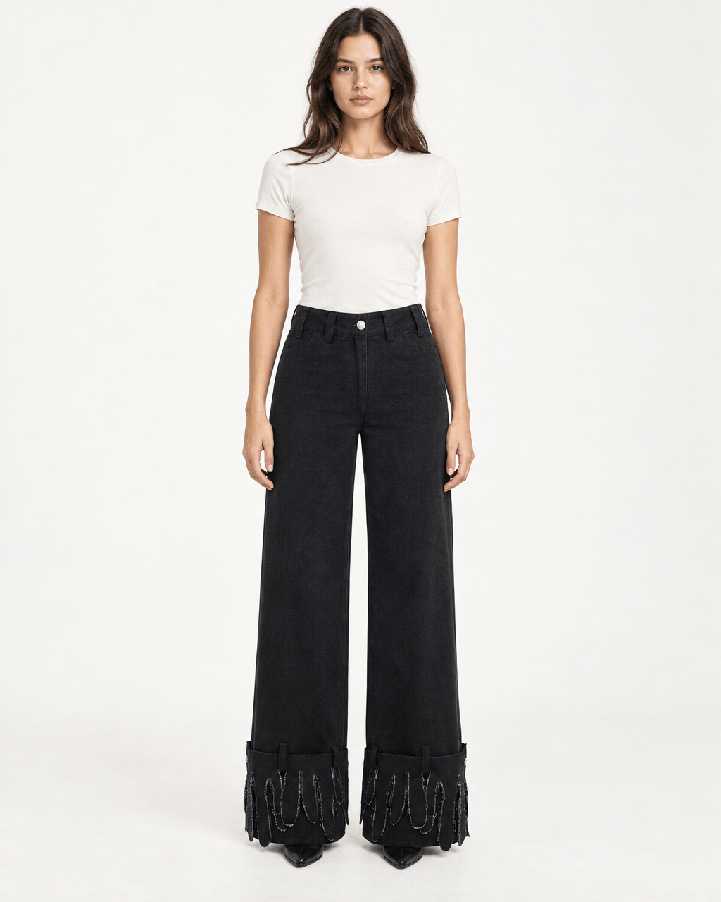 JENDUE Luciano Trousers - Wide-Leg Black Denim Pants model wearing stylish black jeans with fringe detailing.