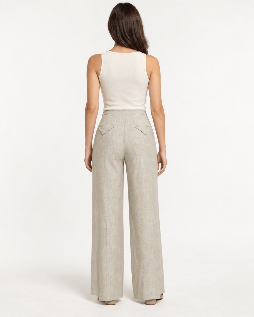 Back view of a woman wearing JENDUE Lia Linen Pants- High-Waist Wide Leg Trousers with a fitted tank top.