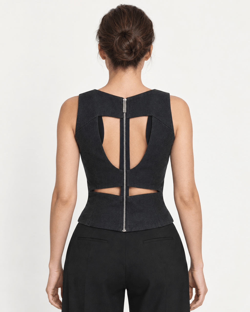 Back view of the JENDUE Stelly Denim Top V-Neck Corset featuring cut-out design and zipper detail.