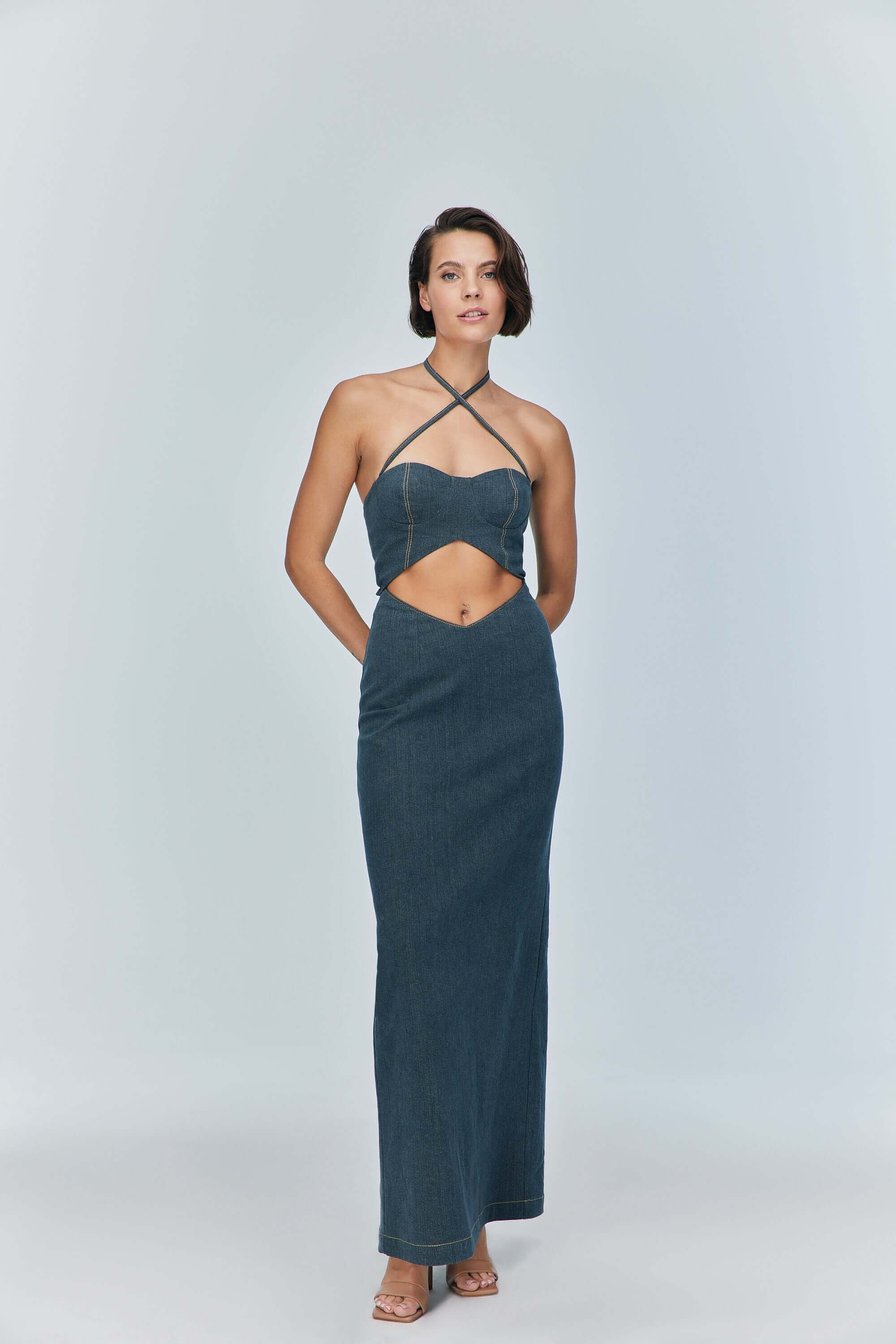 JENDUE's "Monte" blue maxi dress, perfect for special occasions, offering a sleek silhouette.