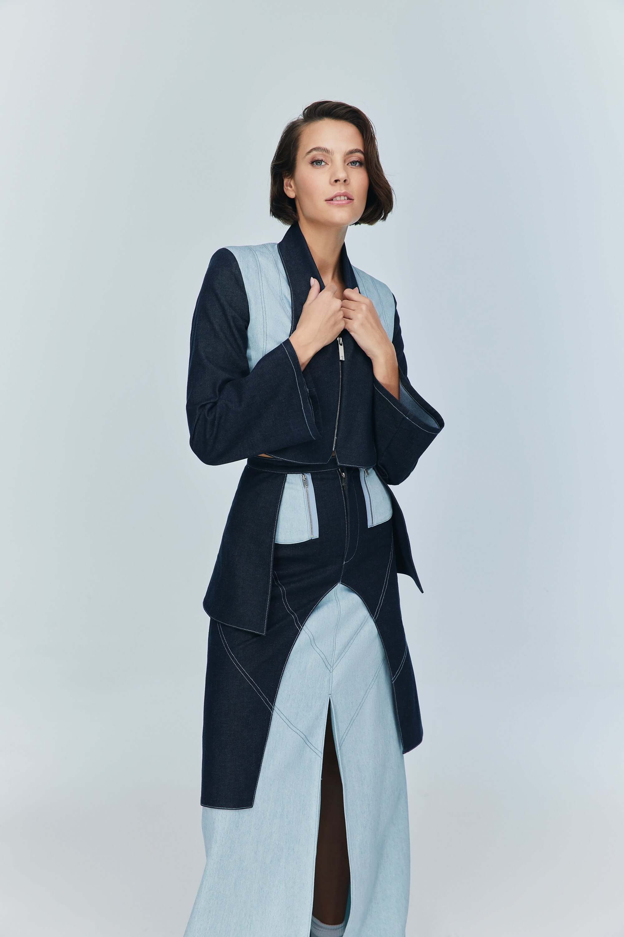 JENDUE fashionable blue denim skirt: ankle length, with a raw hem and distinct color blocking.