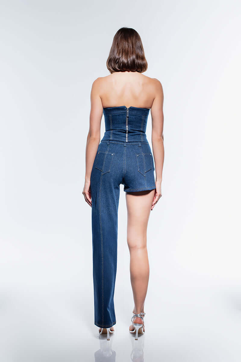 Dark wash denim corset top with structured boning and contrasting yellow seam details.