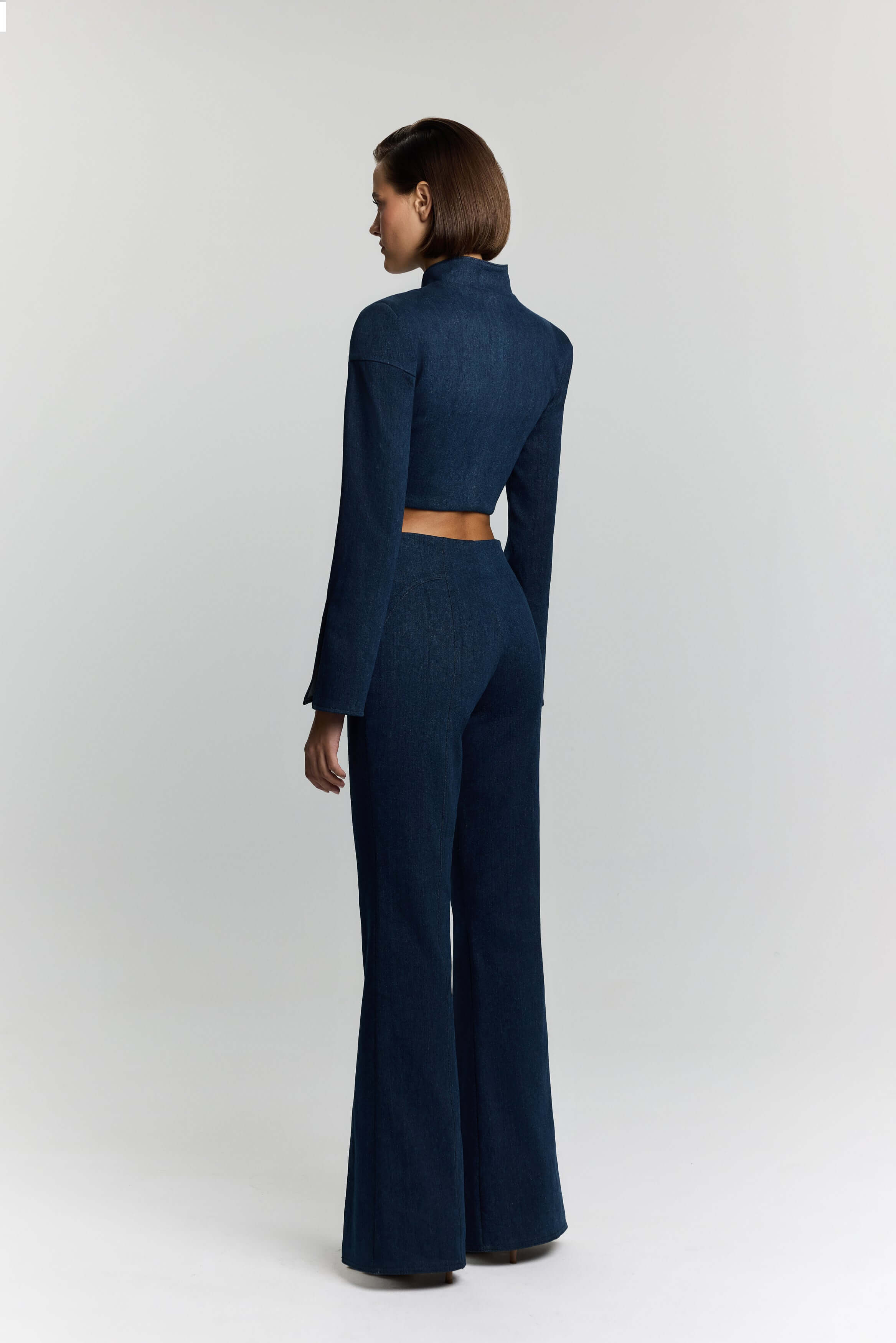 JENDUE Modern blue denim cropped jacket: high collar, single button, and a sophisticated, structured look.